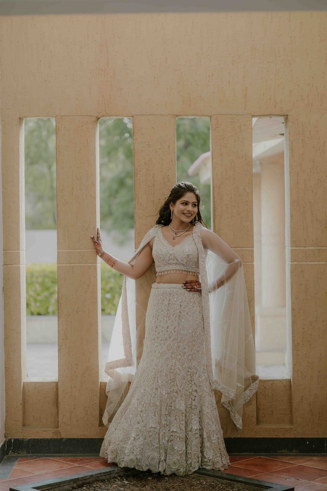 Bride in ivory bridal lehenga